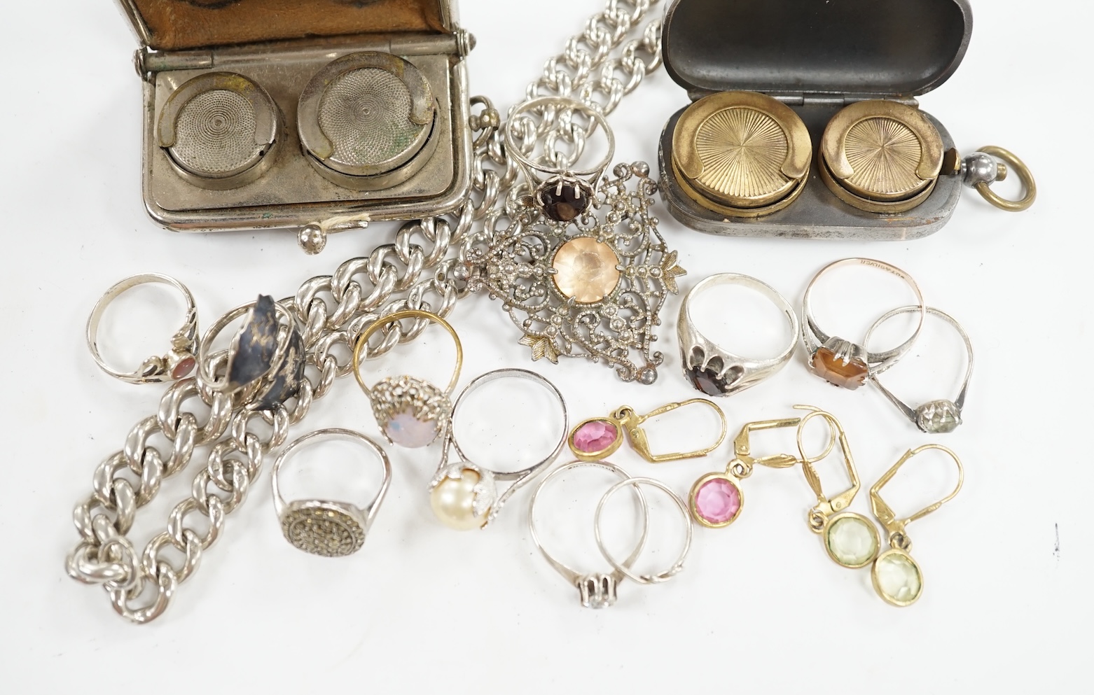 A silver graduated curb link albert, 41cm, two base metal sovereign cases and a small collection of assorted jewellery including silver and white metal rings. Condition - poor to fair to good